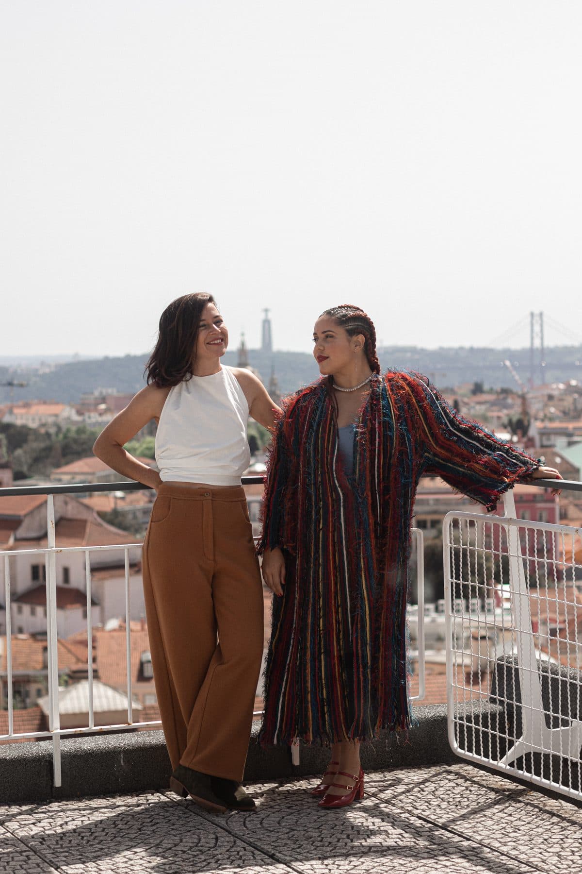 Paula and Leonor on a rooftop